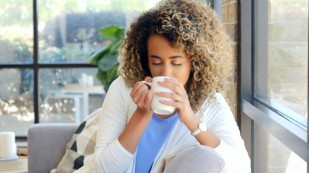 istock Beautiful woman relaxes at home 1014291586