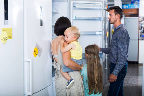 istock family choosing new fridge 1014292068