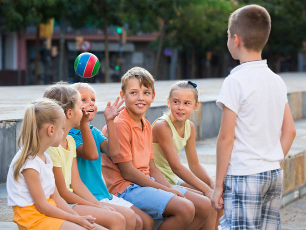 istock children playing with small ball outdoor 1014296930