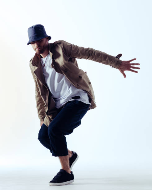 istock Young beautiful male dancer posing in studio 1014299040
