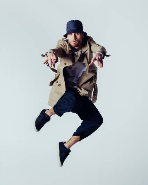 istock Young beautiful male dancer posing in studio 1014308078