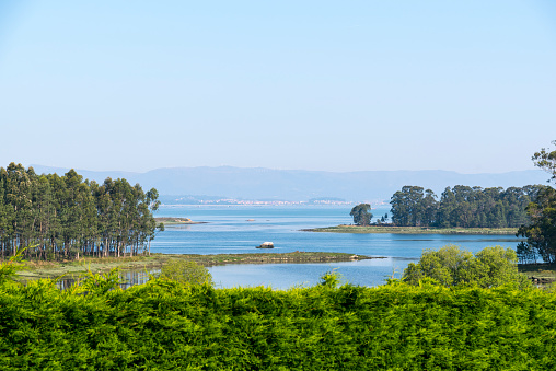 View of the Ria de Arousa. A ria is a saline estuary, that forms a firth. It is one of the five Rias Baixas. The Ria de Arousa estuary is the largest of the estuaries of Galicia, and nowadays is a main tourist attraction.