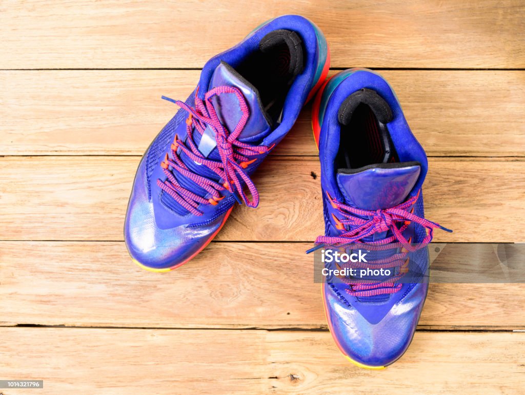 Basketball Sport shoes or sneakers on wooden board Activity Stock Photo