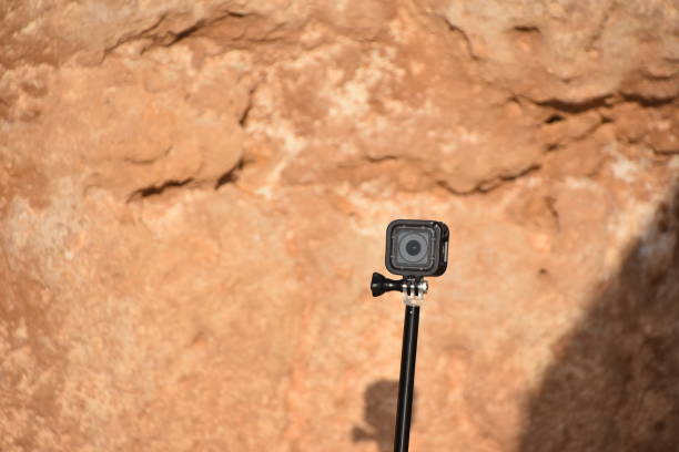 istock Extreme camera on tripod against rocks 1014322218
