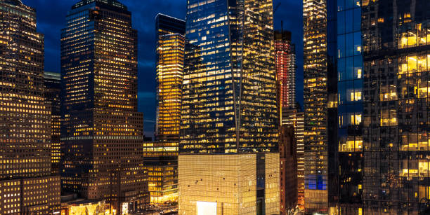 Illuminated skyscrapers at dusk
