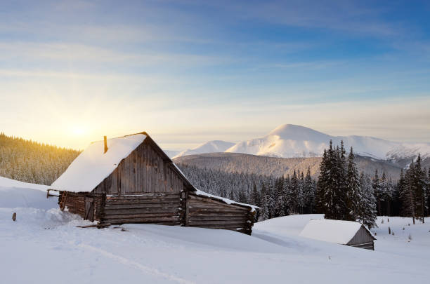 istock Cabin in the mountains in winter 1014332664