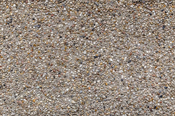 istock Concrete Gravel Pebble Stone Texture Background. 1014333158