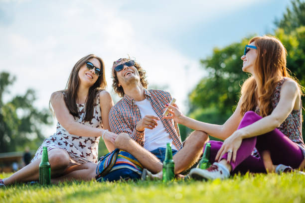 istock Joyful afternoon in public park with friends 1014346144