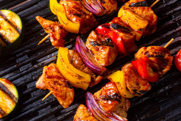 istock Rustic shish kebab skewers with marinated ham meat paprika and red onion 1014351342
