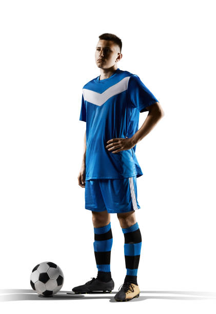 istock Young soccer player isolated on white background 1014363714