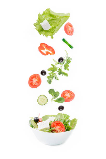 istock Fresh vegetable salad on white background. 1014363970