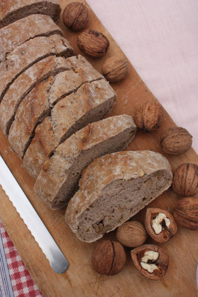 istock Bread sliced with walnuts  Handcrafted product 1014368240