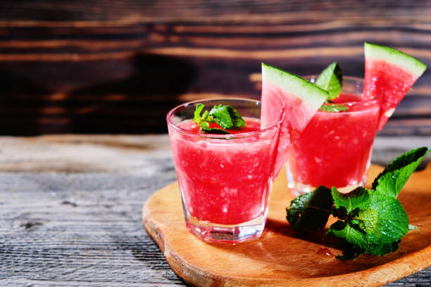 istock Watermelon cocktail on a wooden table. 1014368360