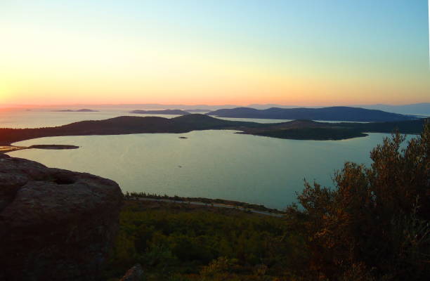 istock Ayvalik, Seytan softasi sunset view 1014372030