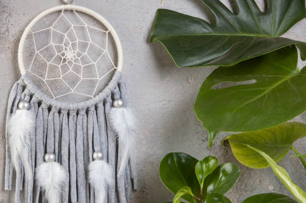 istock Gray beige dream catcher on gray 1014390334