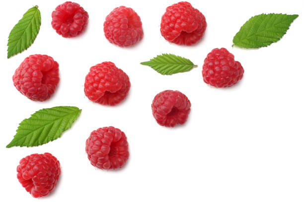 istock ripe raspberries with green leaf isolated on white background. top view 1014398960