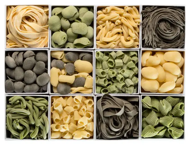 Assorted fresh pasta shapes placed in the boxes.
