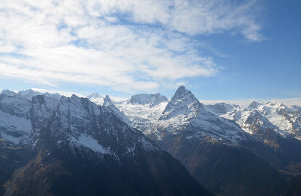 istock Snow covered Greater Caucasus mountains at winter sunny day 1014407418