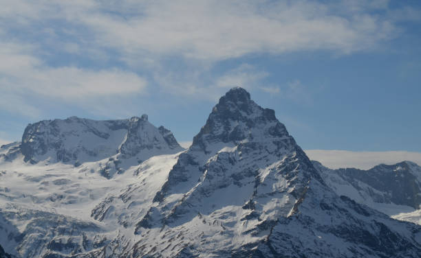 istock Snow covered Greater Caucasus mountains at winter sunny day 1014407520