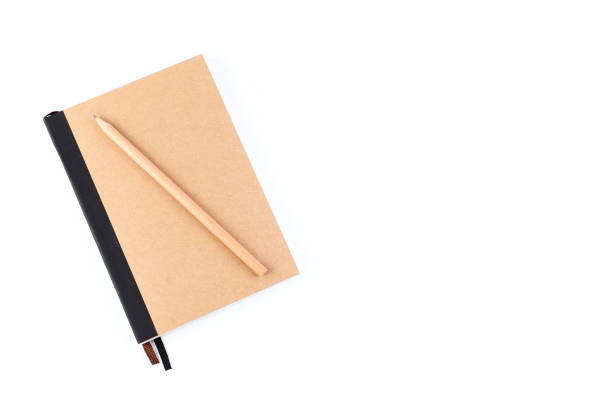 istock Top view cover note book with cream with pencil placed on white background, space for letter type. Isolated , Copy space. 1014413708