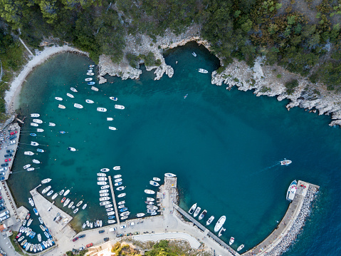 Small marina in a small bay on the Adriatic sea from above