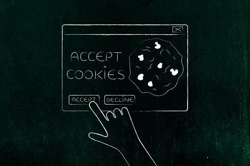 cookie policy concept: hand about to click on Accept Cookie pop-up message