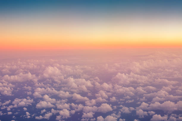 istock Flying above the clouds. Aerial view from the airplane 1014415614