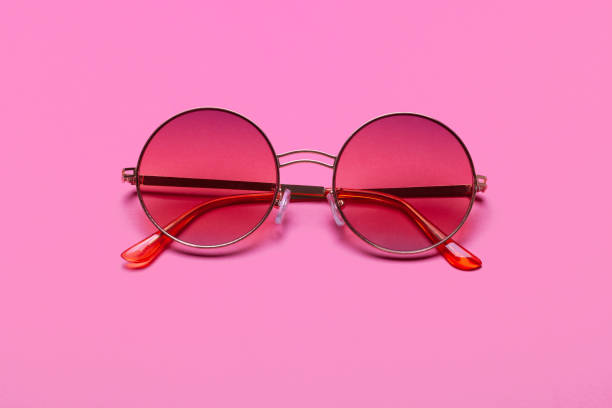 istock Beautiful trendly sunglasses on a pink background 1014415804
