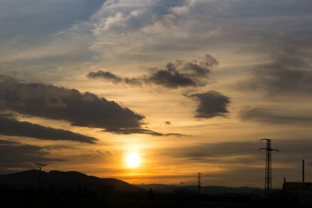istock Sunset on the road with traffic. 1014426280