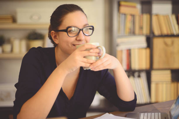 istock young woman working at home 1014432318