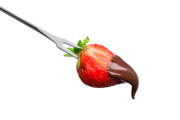 istock Fondue half of a ripe strawberry 1014447526