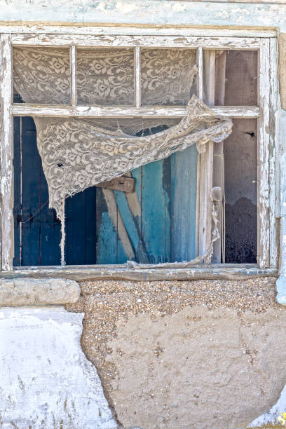 Old window in a ruined house
