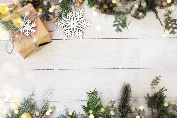 istock Christmas background on the white wooden desk 1014454116