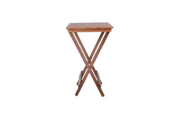 istock Outdoor wooden dining table with two stools on white background 1014458632