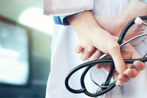 istock Doctor with a stethoscope in the hands 1014459128