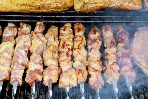 istock Fresh meat shish kebab prepared on a grill. 1014461552