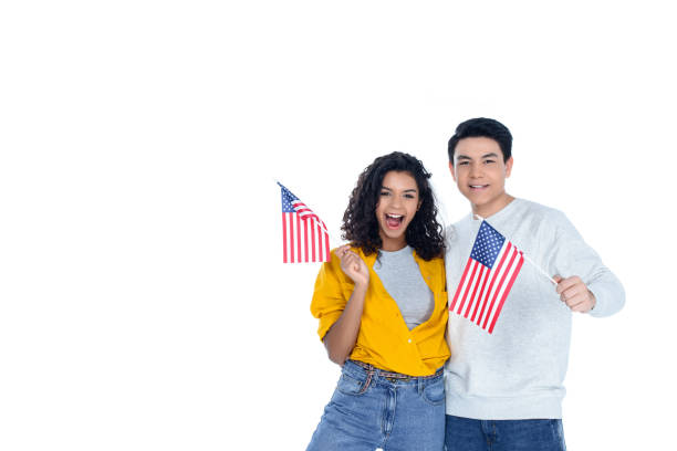 istock smiling teenage students with usa flags isolated on white 1014462484