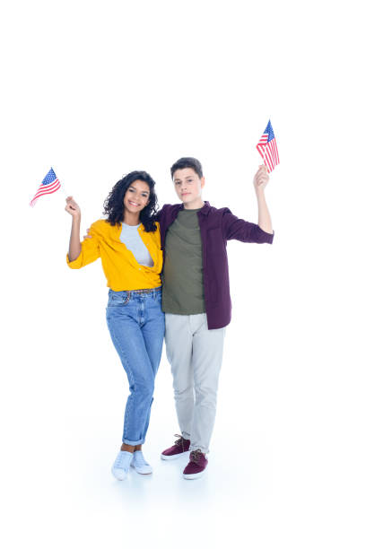 istock teenage students with american flags isolated on white 1014462498