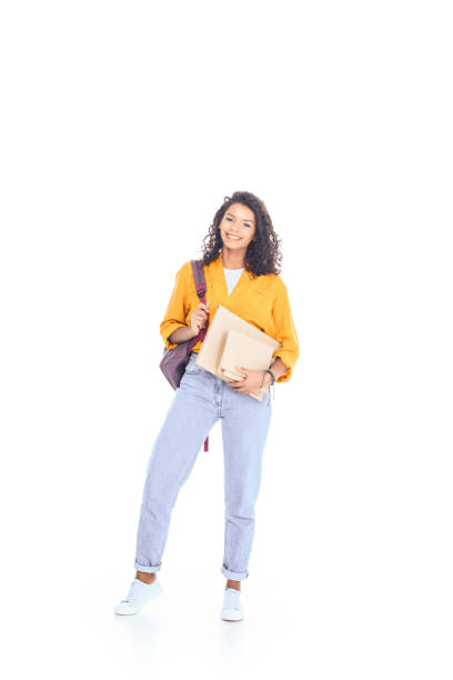 istock smiling african american student with backpack and books isolated on white 1014465288