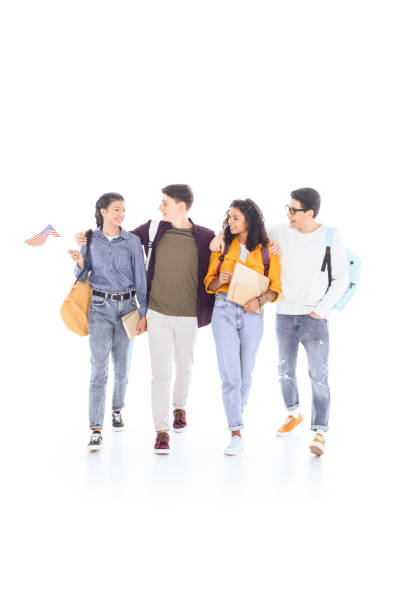 istock multiethnic students with notebooks and american flag isolated on white 1014465386