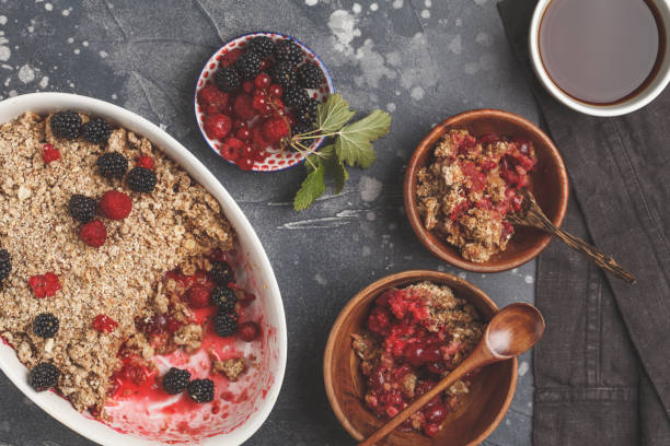 istock Breakfast with coffee and crumble pie, dark background, healthy vegan breakfast concept. 1014465692