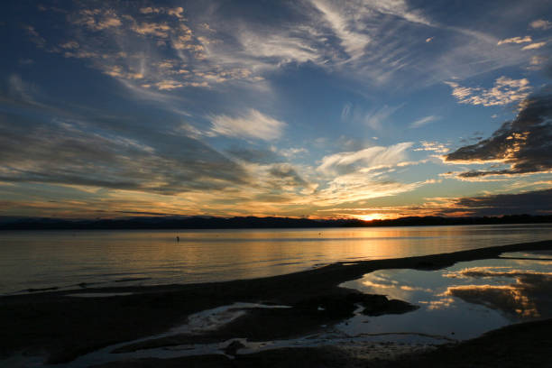 istock Vermont Sunsets and Sunrises over Water 1014470518