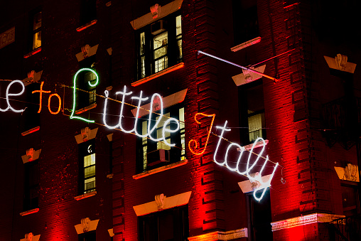 The neon sign of Little Italy, New York, at night.