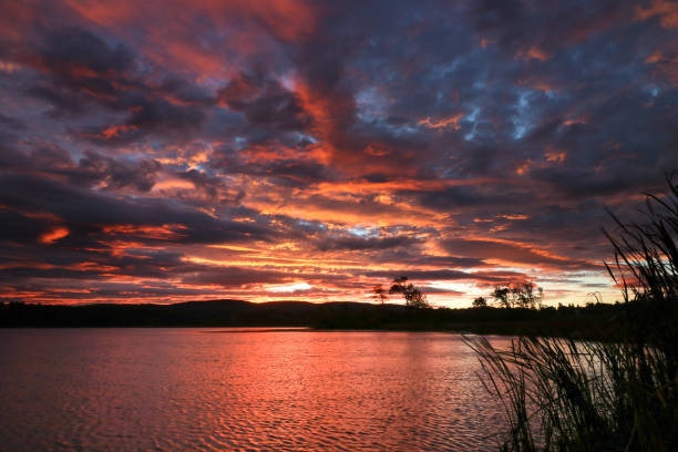istock Vermont Sunsets and Sunrises over Water 1014470988