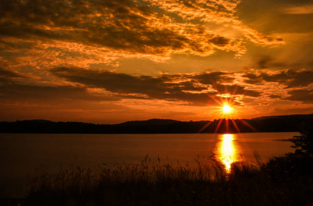 istock Vermont Sunsets and Sunrises over Water 1014471308