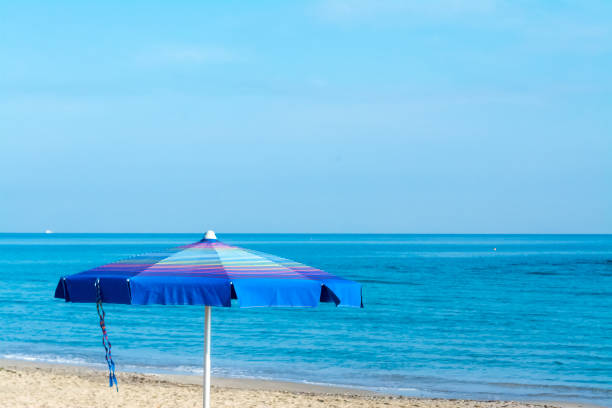 istock Beach umbrella near the sea 1014477220