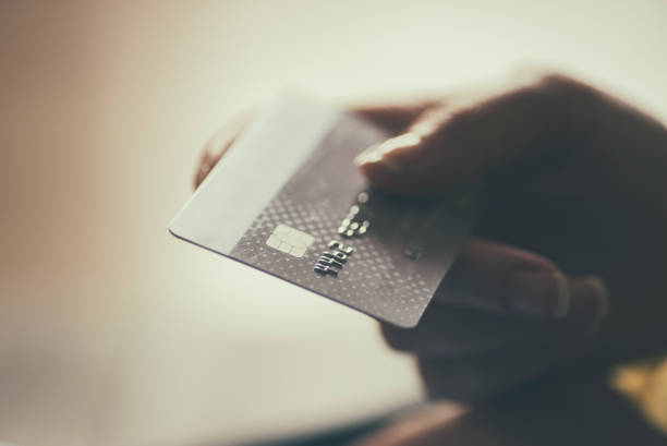 istock Finance concept - girl holding a credit card 1014479992