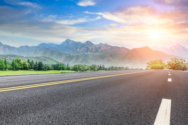 istock Asphalt highway and green mountain nature landscape 1014480062