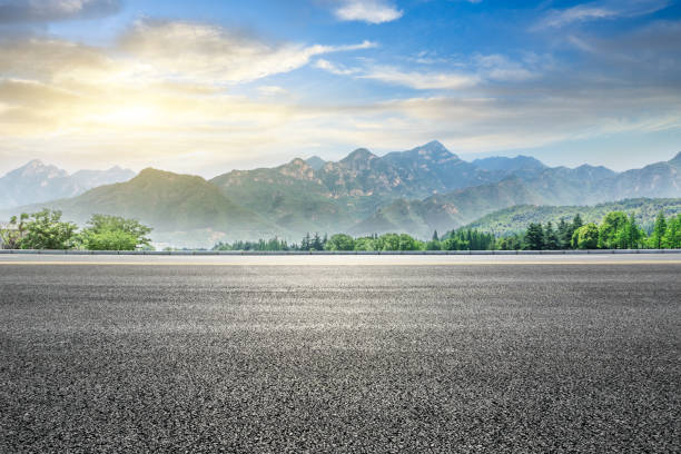 istock Asphalt highway and green mountain nature landscape 1014481420