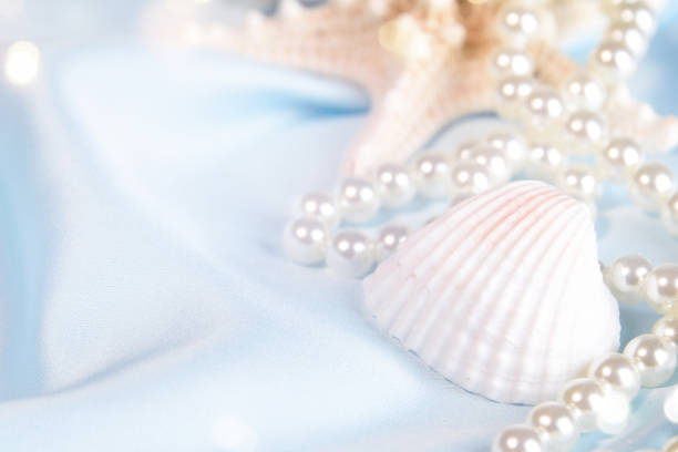 istock Wedding background with pearls and sea shell. Luxury wedding background 1014485790